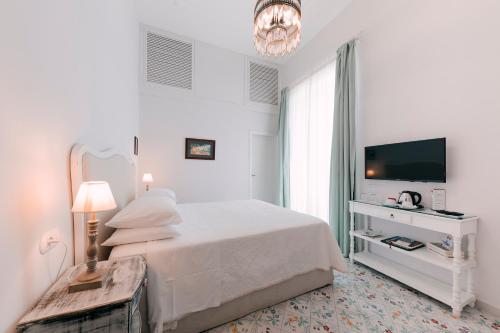 Letto o letti in una camera di Hotel Villa Maria