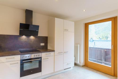 Una cocina o zona de cocina en Apartmenthaus Jagdhof