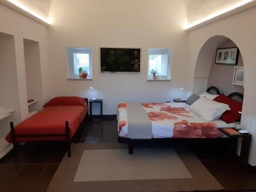 A bed or beds in a room at Alla Panoramica