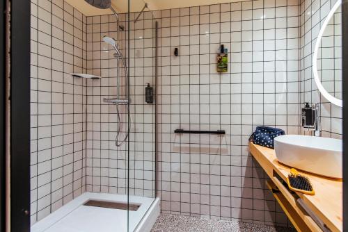 a bathroom with a shower and a sink at Ibis Styles Rouen Centre Rive Gauche in Rouen