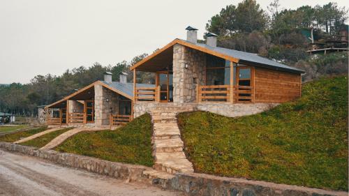 a house on a hill on a dirt road at Sahil Kamp İstanbul Hotel in Sile