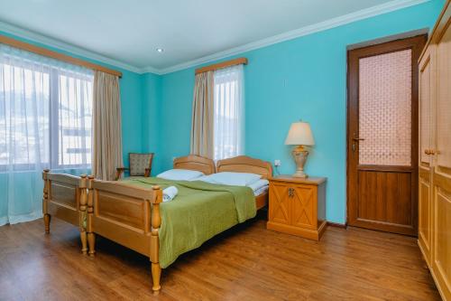 A bed or beds in a room at Hotel Lileo