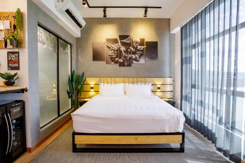 Katil atau katil-katil dalam bilik di AISI3 Studio Seaview at Tanjung Lumpur