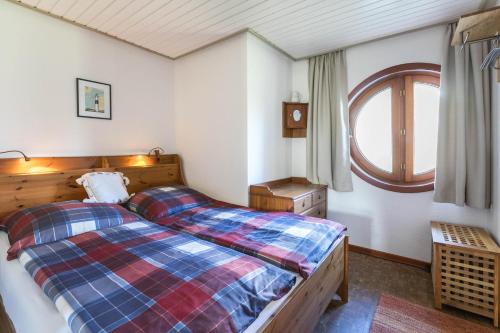 Łóżko lub łóżka w pokoju w obiekcie Zur Kajüte Friedrichskoog