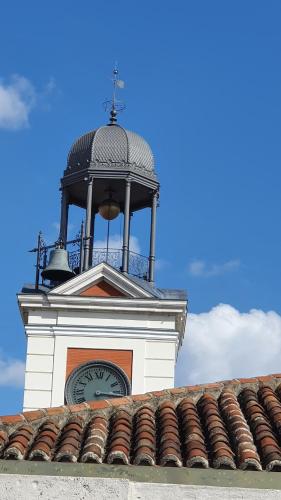 a clock tower on top of a building at Hostal Riesco in Madrid