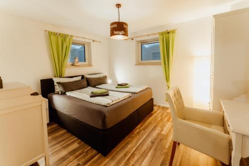 Ένα ή περισσότερα κρεβάτια σε δωμάτιο στο Ferienwohnung Andreas