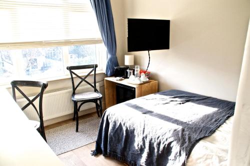 Katil atau katil-katil dalam bilik di Brookview Guest House