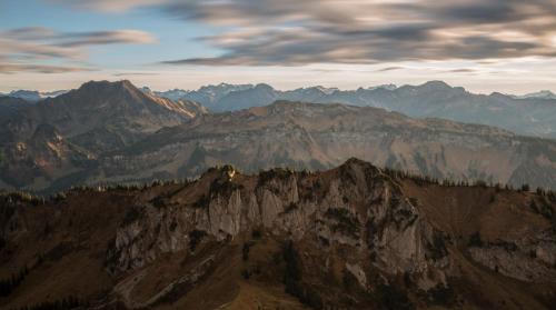 a view of a mountain range with mountains in the background at Hotel St Hubertus in Egg