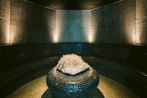 a large vase sitting on a floor in a room at Boringdon Hall Hotel and Spa in Plymouth