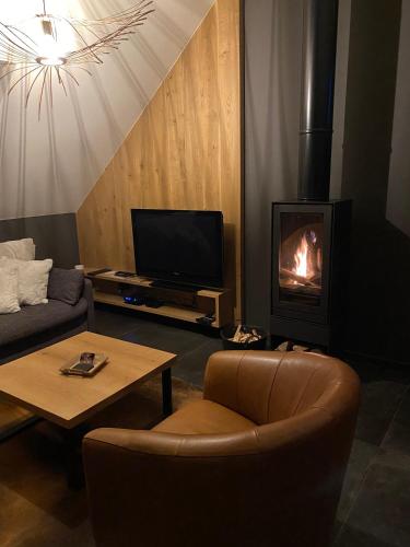 Refuge des 4 Asにあるテレビまたはエンターテインメントセンター