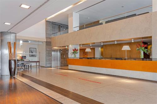 a lobby of a hospital with a waiting room at Hotel Marina Atlântico in Ponta Delgada