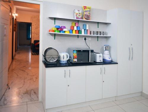 Cuisine ou kitchenette dans l'établissement The Hood Hostel