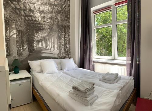 Posteľ alebo postele v izbe v ubytovaní VULTOR Apartments