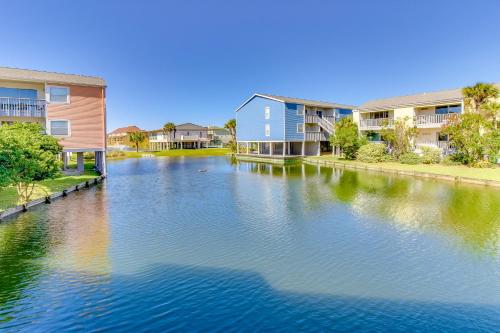 a body of water with houses and condos at Villas on the Gulf in Gulf Breeze
