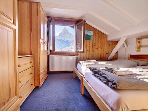 Postel nebo postele na pokoji v ubytování Apartment with beautiful views in Zermatt