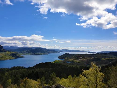 a view of a lake in the mountains at NorGlamp Glamping in Hjelmeland