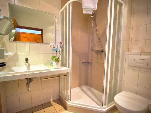 Koupelna v ubytování Meister BÄR HOTEL Wettiner Hof