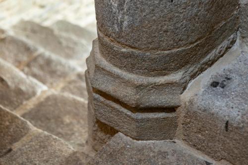 a close up of a stone column on a building at La Metairie-du-Vauhariot - Vue Mer et Mont Saint Michel - Piscine Chauffée - Accès GR34 in Cancale