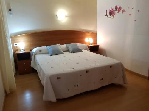 Postel nebo postele na pokoji v ubytování Hostal Mary - ADULTS ONLY