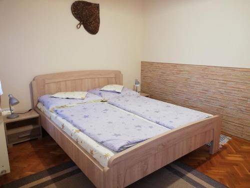 Cama o camas de una habitación en Imola És Andrea Apartmanház