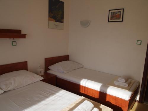 Katil atau katil-katil dalam bilik di Apartments Edita