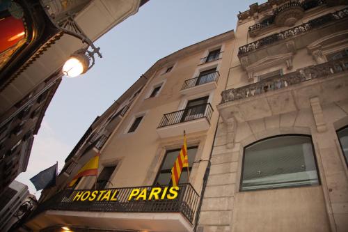 a building with the words hospital paris on it at Hostal Paris in Barcelona