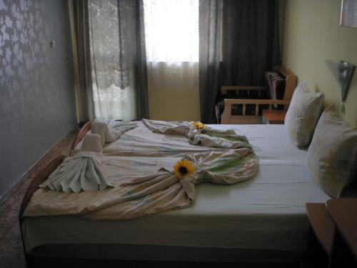 Postel nebo postele na pokoji v ubytování Violeta 7 Guest House