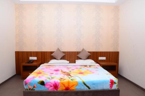 מיטה או מיטות בחדר ב-DUDI HOTEL