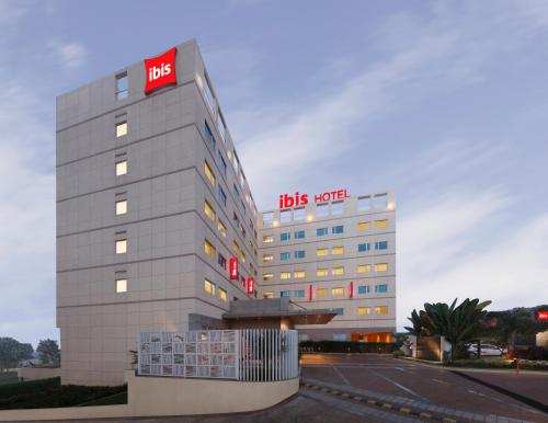 a hospital building with a hds world sign on it at ibis Pune Hinjewadi - An Accor Brand in Pune