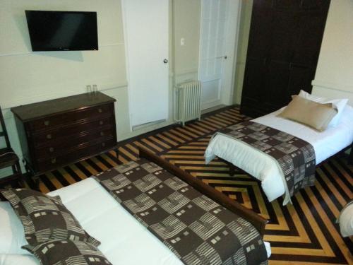 Кровать или кровати в номере New Arapey Hotel