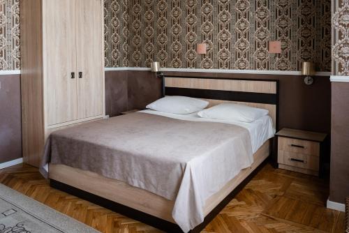 Krevet ili kreveti u jedinici u okviru objekta Priokskaya Hotel