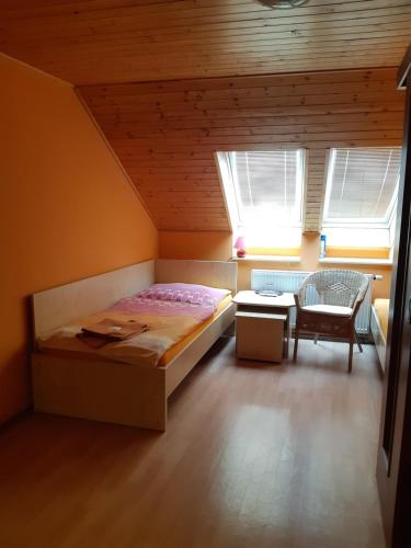 Кровать или кровати в номере Penzion Loučka