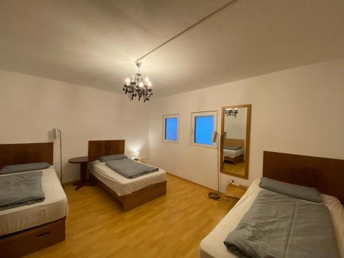 En eller flere senge i et værelse på English Romance Langenhagen