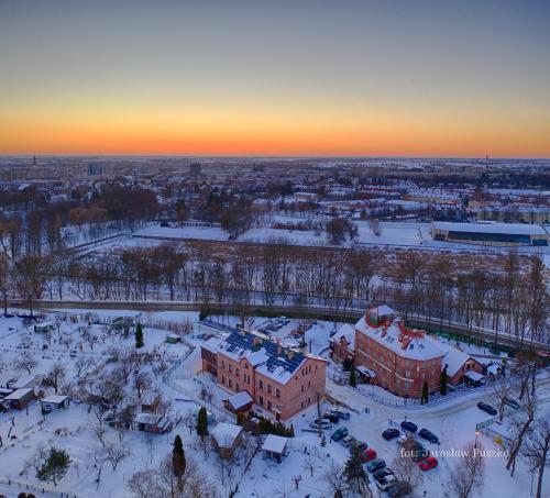 an aerial view of a city in the snow at Hotel Młyn Aqua Spa in Elblag