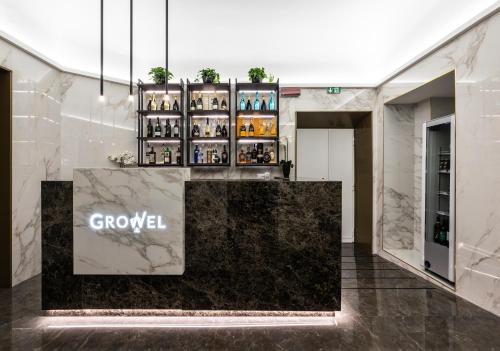 a store with a black counter in a room at Growel Exclusive Suites San Pietro in Rome