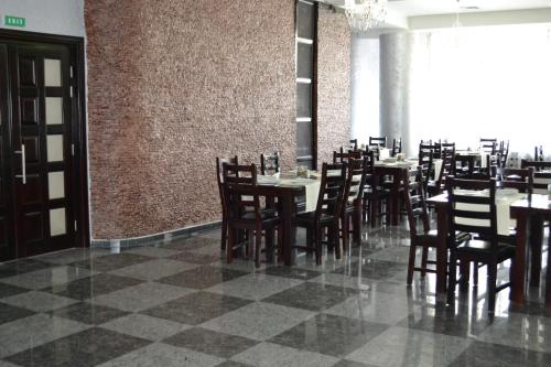 Ein Restaurant oder anderes Speiselokal in der Unterkunft Hotel Unirea 