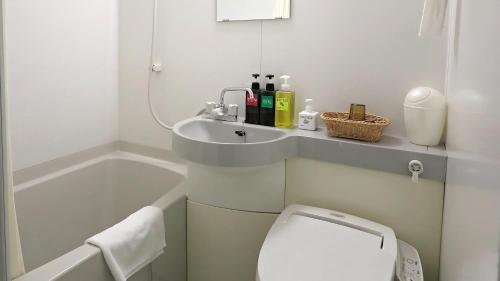 Ένα μπάνιο στο Hotel Annex Inn