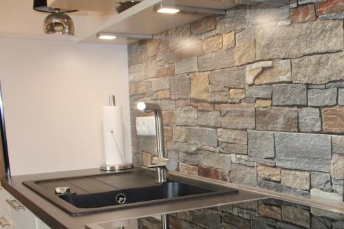 Kuchyň nebo kuchyňský kout v ubytování Apartment Sonnenschein, Am Alten Deich 4-6, Whg 1 13