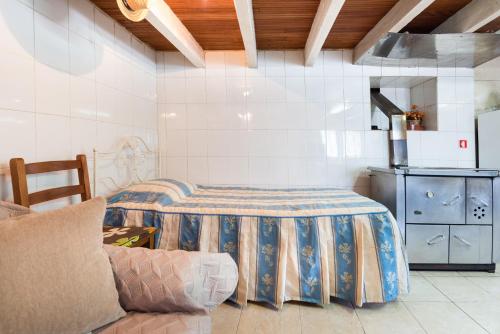 En eller flere senge i et værelse på Villa Douro