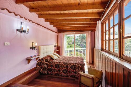 Posteľ alebo postele v izbe v ubytovaní Charming House in Buenavista del Norte with Shared Pool