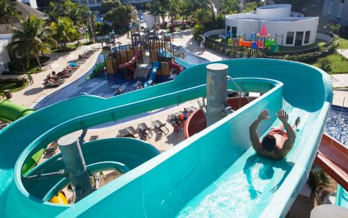 an image of a water slide at a water park at Royalton Hideaway Blue Waters, An Autograph Collection All-Inclusive Resort - Adults Only in Falmouth