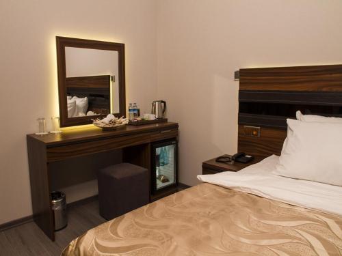 Katil atau katil-katil dalam bilik di Hotel Atabay