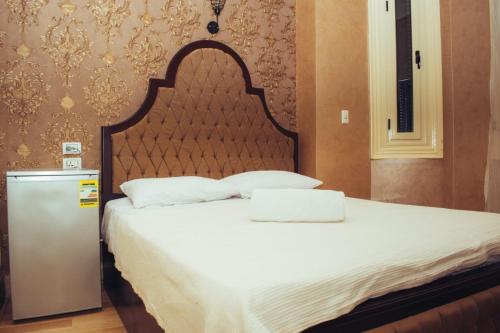 Cama o camas de una habitación en Heritage Hostel Cairo