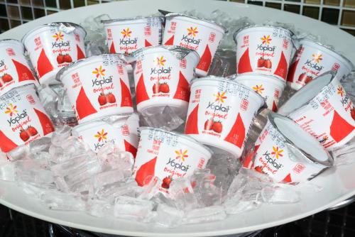 a bunch of soda cups in ice on a plate at Days Inn by Wyndham Atlanta Stone Mountain in Stone Mountain