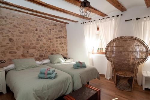 Säng eller sängar i ett rum på La Casa El Cura