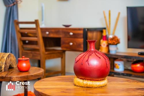 Crest Homes Ugandaにあるテレビまたはエンターテインメントセンター