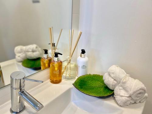 a bathroom counter with a sink and a mirror at InSide Furnas in Furnas