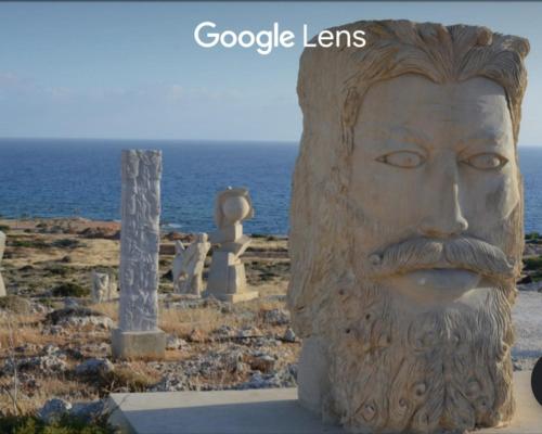 a statue of a man with a beard next to the ocean at Panthoma Casa in Ayia Napa