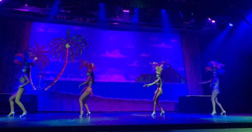 a group of women dancing on a stage at VILLA PARA 5P 4A 1M dentro del Hotel a un lado del Krystal IXTAPA Con Playa WiFi in Ixtapa