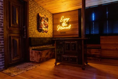 a room with a sign that says say the strongest at Glamping montain experience in São Joaquim